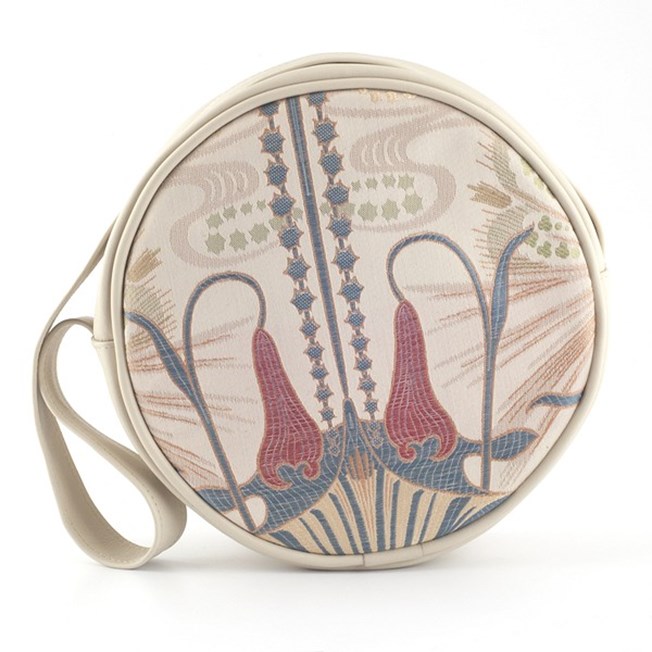 Round handbag made of elegant art nouveau fabric, combined with cream-coloured leather