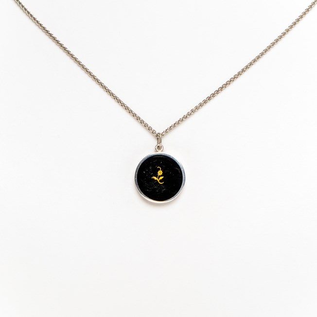 Circle with Golden Flower Pendant