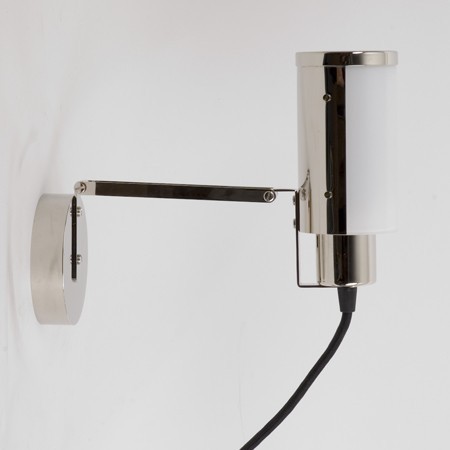 Multifunctional desk/wall/table lamp. Here shown as table/desk lamp.